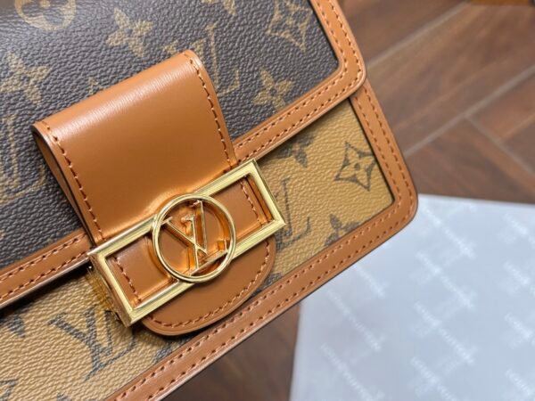 LV Daphine Messenger Bag, made of full-grain cowhide.
