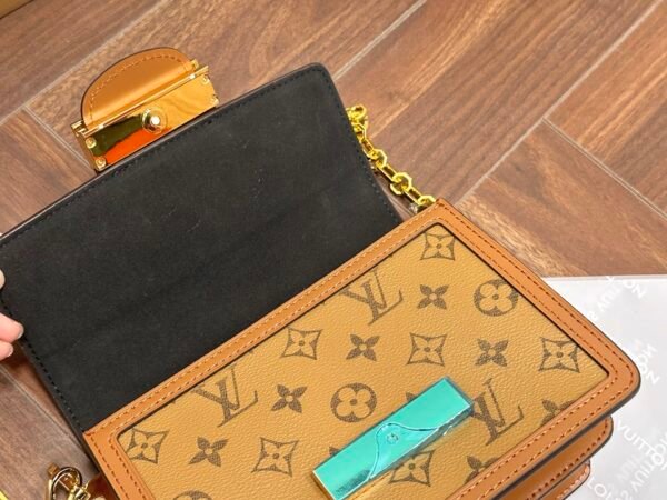 LV Daphine Messenger Bag, made of full-grain cowhide.