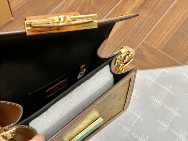 LV Daphine Messenger Bag, made of full-grain cowhide.